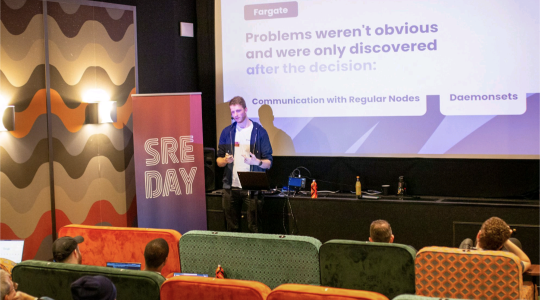 Marius speaking at a conference